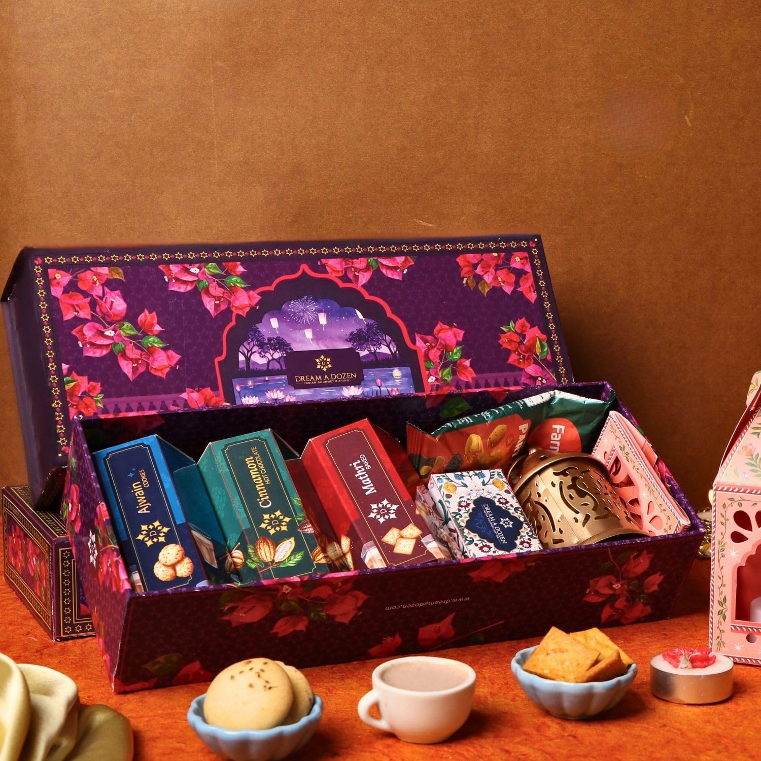 Dream a Dozen Whispers of Bloom Diwali Gift Hamper | Luxury Festive Gift Box with Eggless Ajwain Cookies, Mathri Crackers, Peri Peri Mixed Nuts, Cinnamon Hot Chocolate, Festive Greeting Card, DIY Craft Lantern, Lasercut Metal Lantern & Tealight Candles | Eggless Gourmet Snacks Gift Box | Corporate Diwali Gifts for Family, Friends, Clients & Employees-image-5