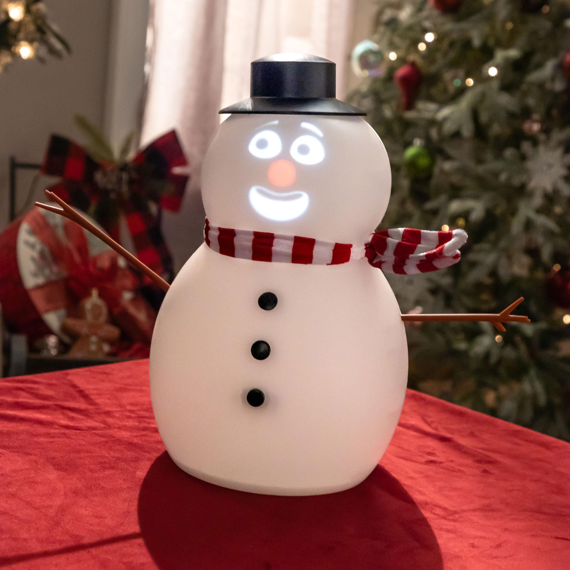 FrostByte (Mr. Chill) Muñeco de nieve animado parlante con proyector integrado y altavoz Plug'n Play