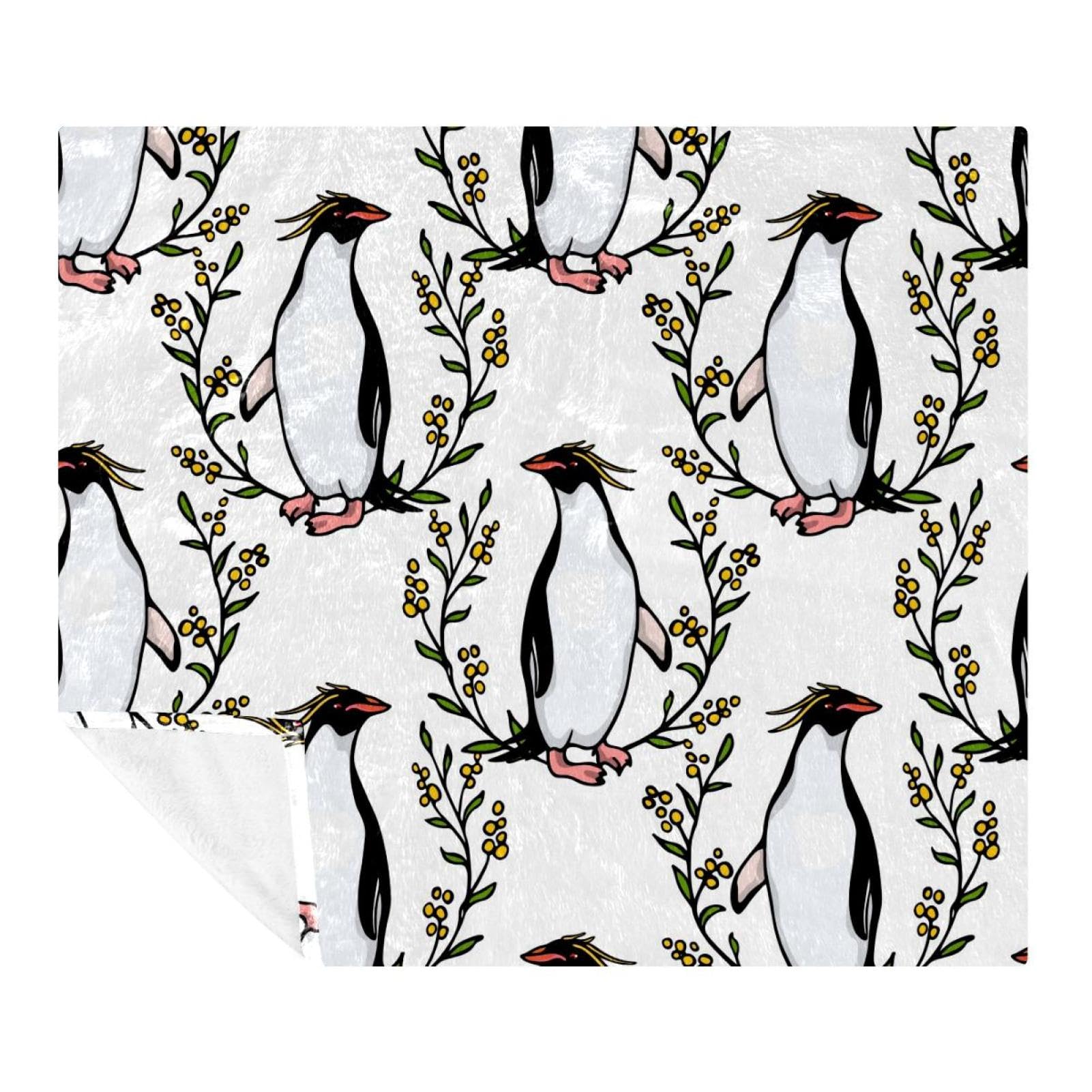 Couverture douce pingouins couronne florale pour vos soirées canapé