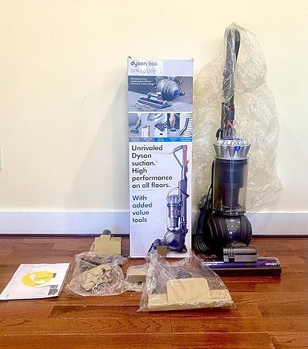 Dyson Ball Animal Pro Aspiradora vertical ajuste de altura, vaciado higiénico, cepillos giratorios, mango telescópico, filtración HEPA de máquina