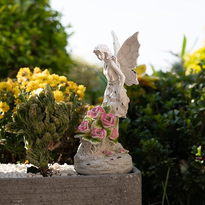 TERESA'S COLLECTIONS Fairy Garden Statues with Solar Outdoor Light are charming and whimsical decor pieces for your garden. These statues feature intricate designs with flowers and other details that add a touch of magic to any outdoor space. The built-in solar light allows for these statues to illuminate your garden at night, creating a magical ambiance.