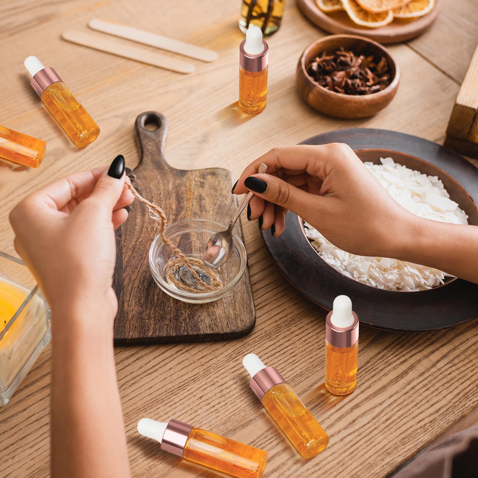 Didaey Lot de 200 mini flacons compte-gouttes en verre avec couvercle pour voyage, huiles essentielles, échantillons liquides et parfums (or rose, 5 ml)