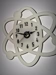 The Atomic Clock Glow in the Dark Wall Clock
