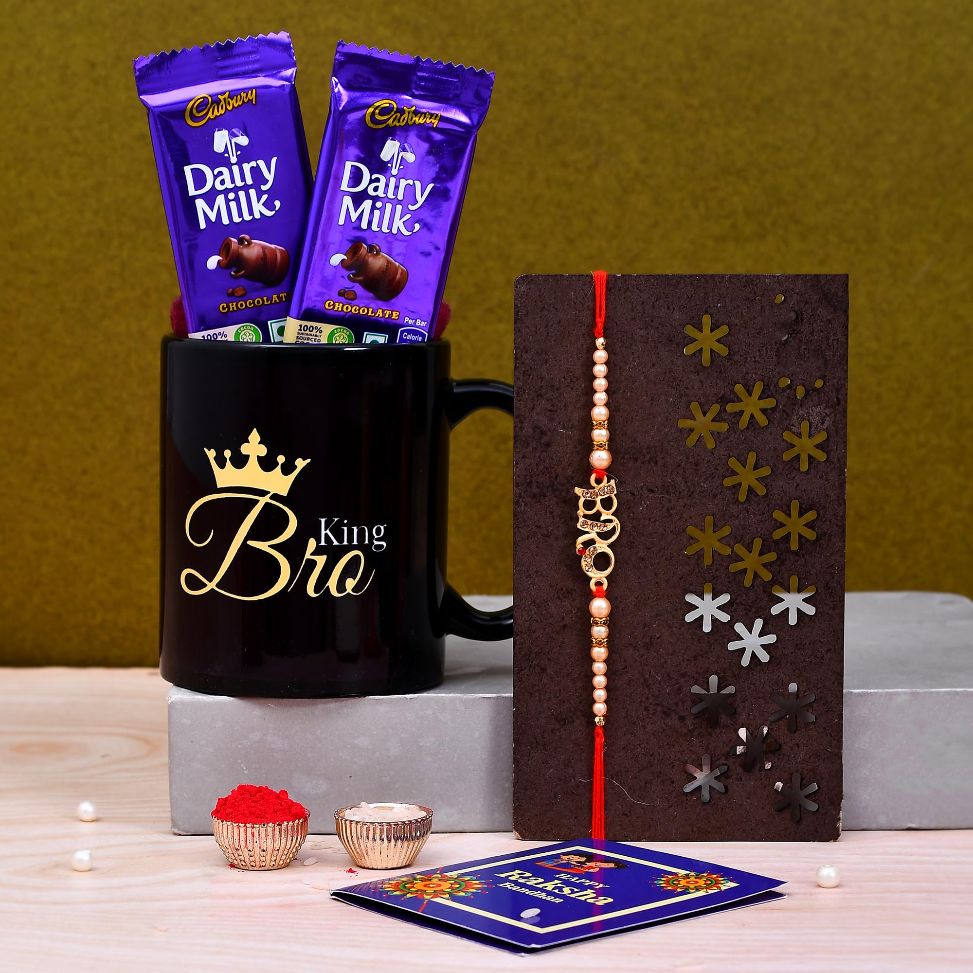 Pride Store Rakhi For Brother Cadbury Dairy Milk Chocolate, Rakhi, Printed Ceramic Mug, Tilak Pack, Greeting Card Chocolate Gifts Combo Set, Rakhi Gift Hampers (2 Chocolate,1 Mug, 1 Rakhi, 1 Greeting card (C))