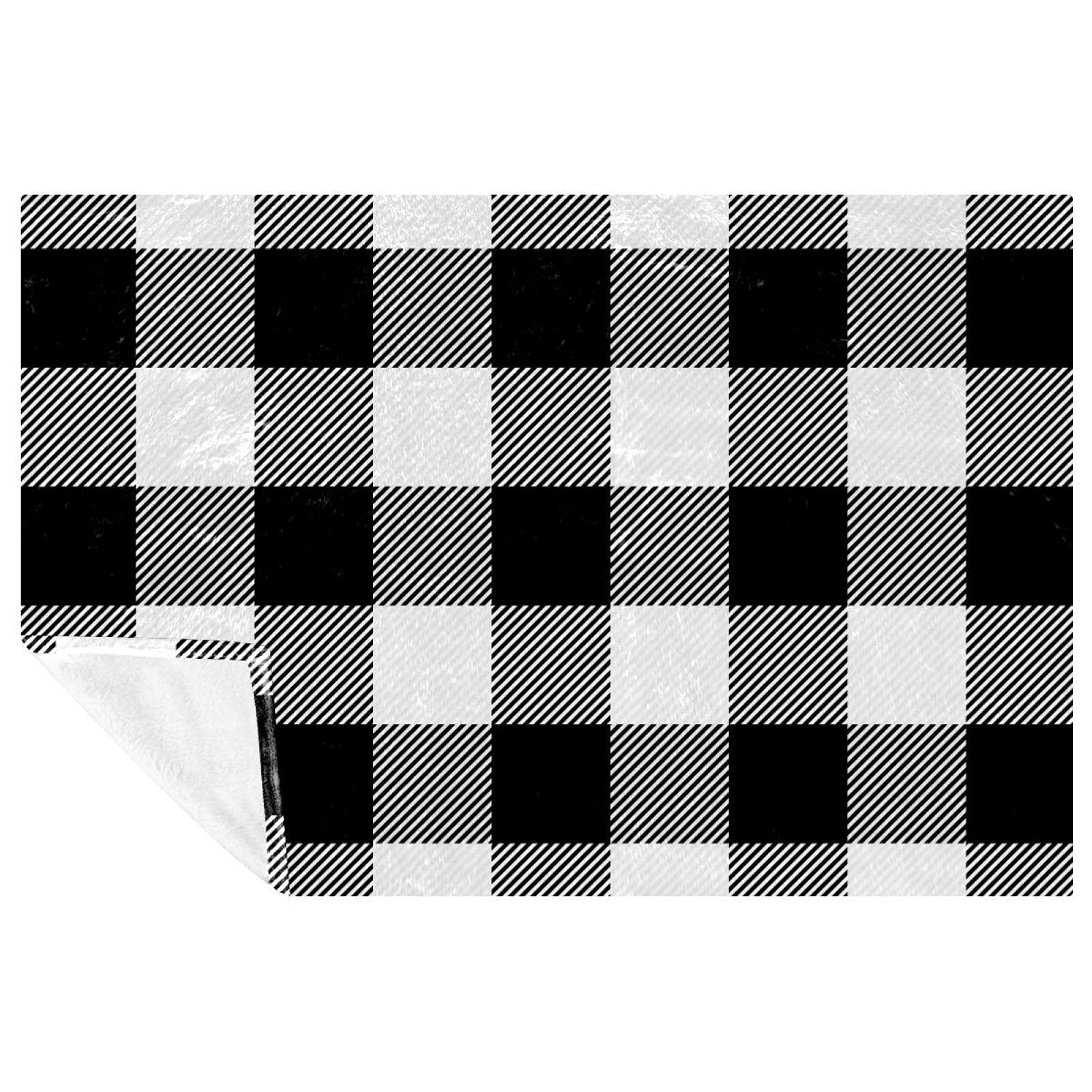 Couverture noire et blanche motif grillage idéale pour vos pique-niques