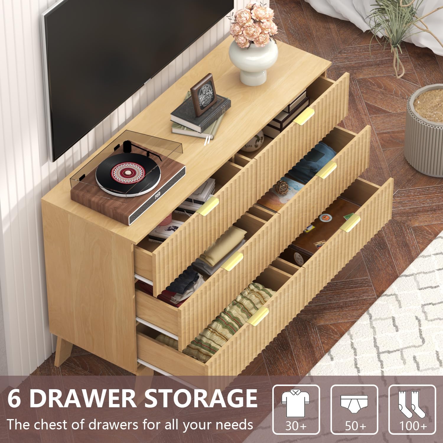 Image showing the interior of the 6 drawers filled with clothes and accessories