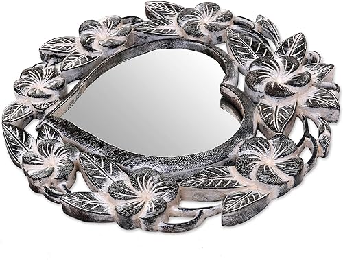 Miniatura 2 de NOVICA Espejo de pared floral tallado a mano de madera de Suar natural en forma de corazón de Indonesia 'Frangipani Heart'