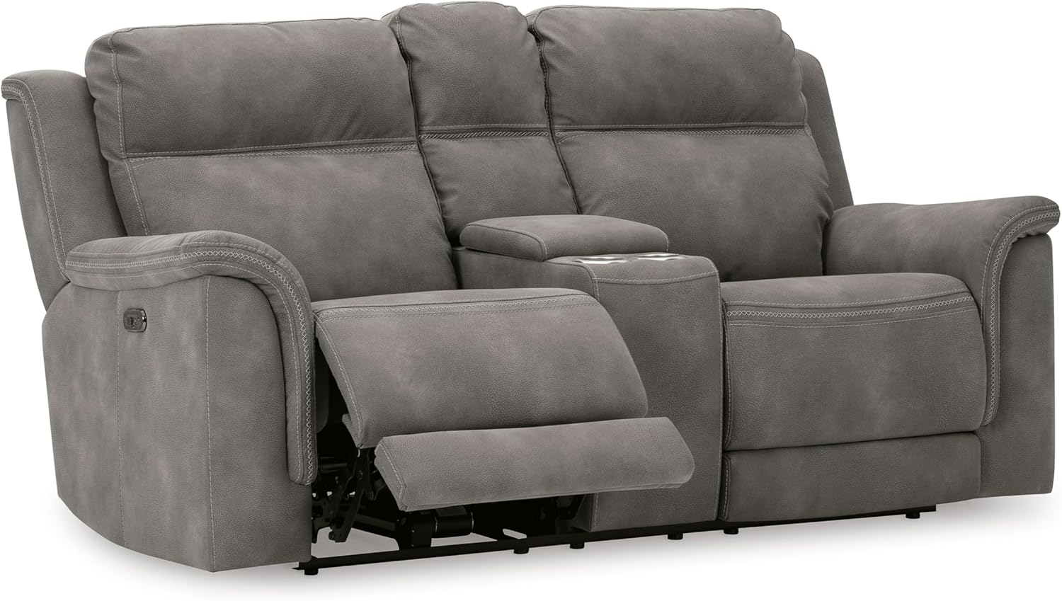 Close-up of the central console with storage and cup holders.