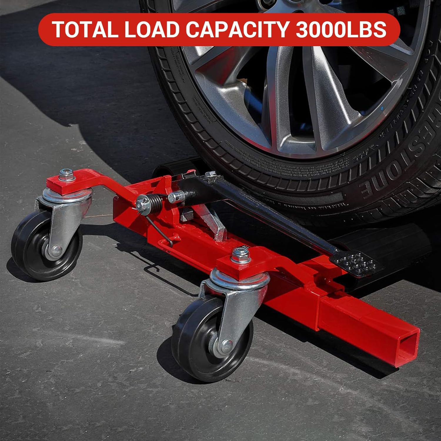 "A set of four bright red Garvee wheel dollies with hydraulic jacks, capable of lifting vehicles up to 1,500 lbs each."