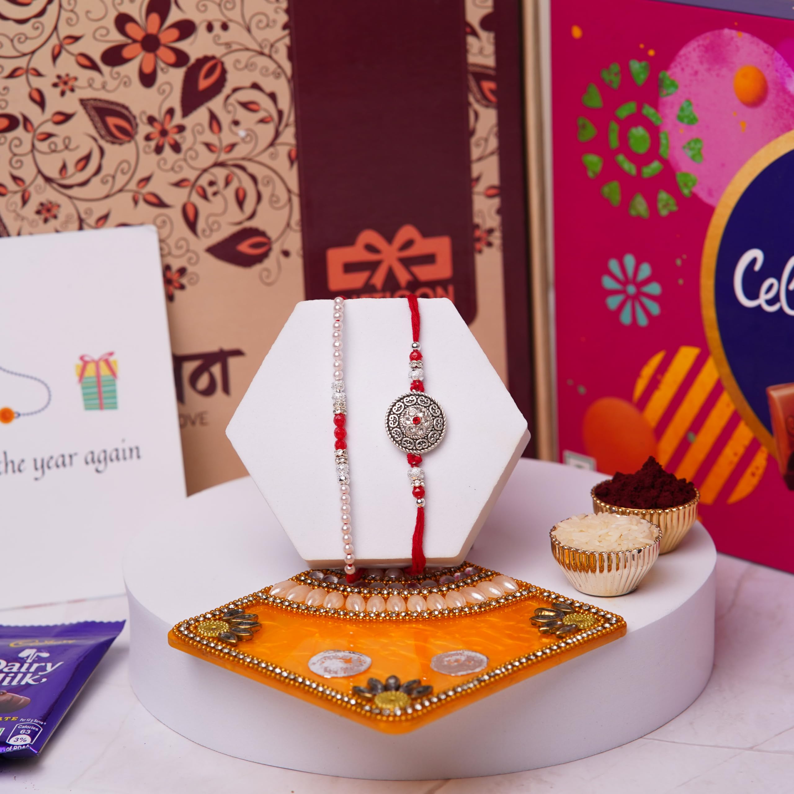 Gifticon Silver Rakhi With Celebrations Chocolate For Brother - Set Of 2 Rakhi For Brother With | 1 Pack Of Celebrations | Roli Chawal | Greeting Card | Gift Box, 350 Gm (B0CCLLZ44N) Amazon Price History, Amazon Price Tracker