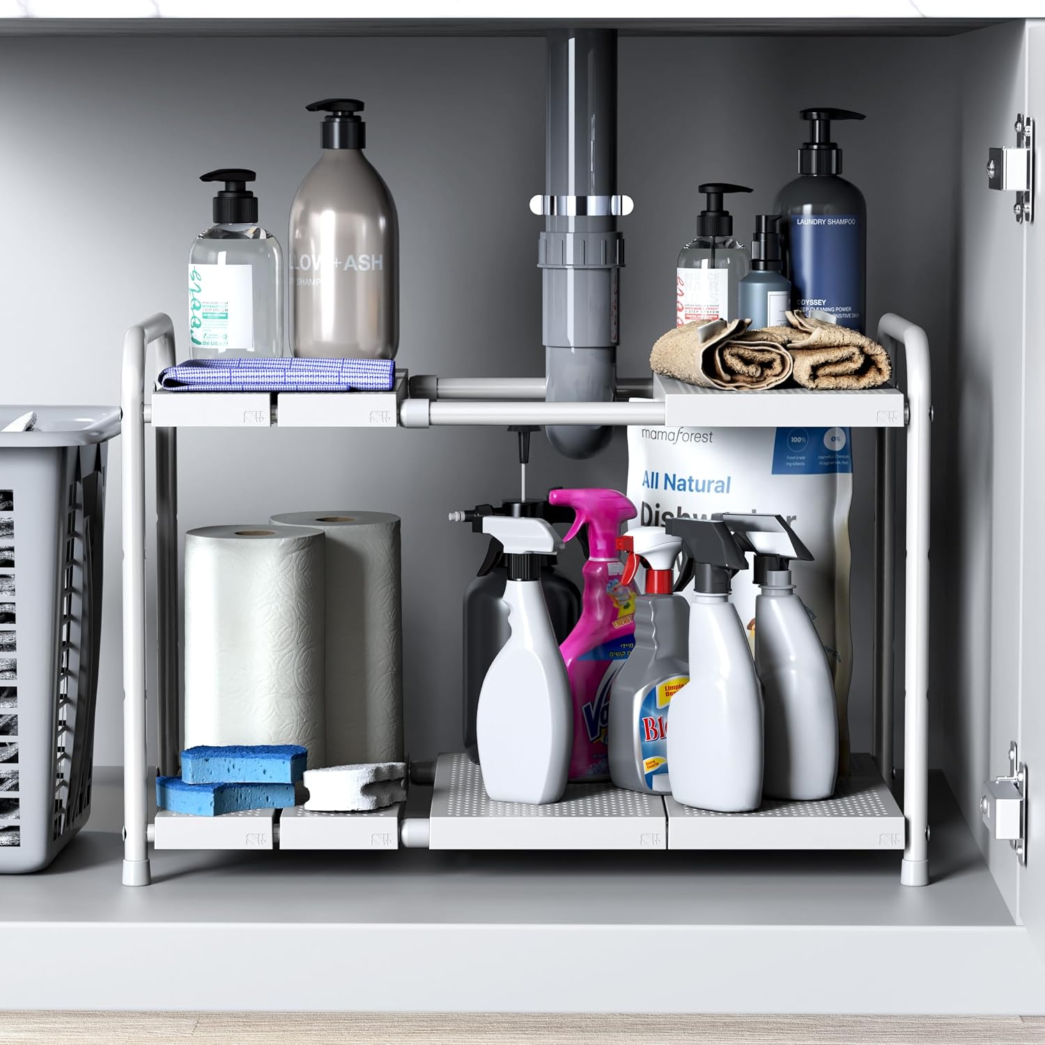 The Simple Houseware Under Sink Organizer installed under a kitchen sink, holding various cleaning supplies and maximizing storage space.