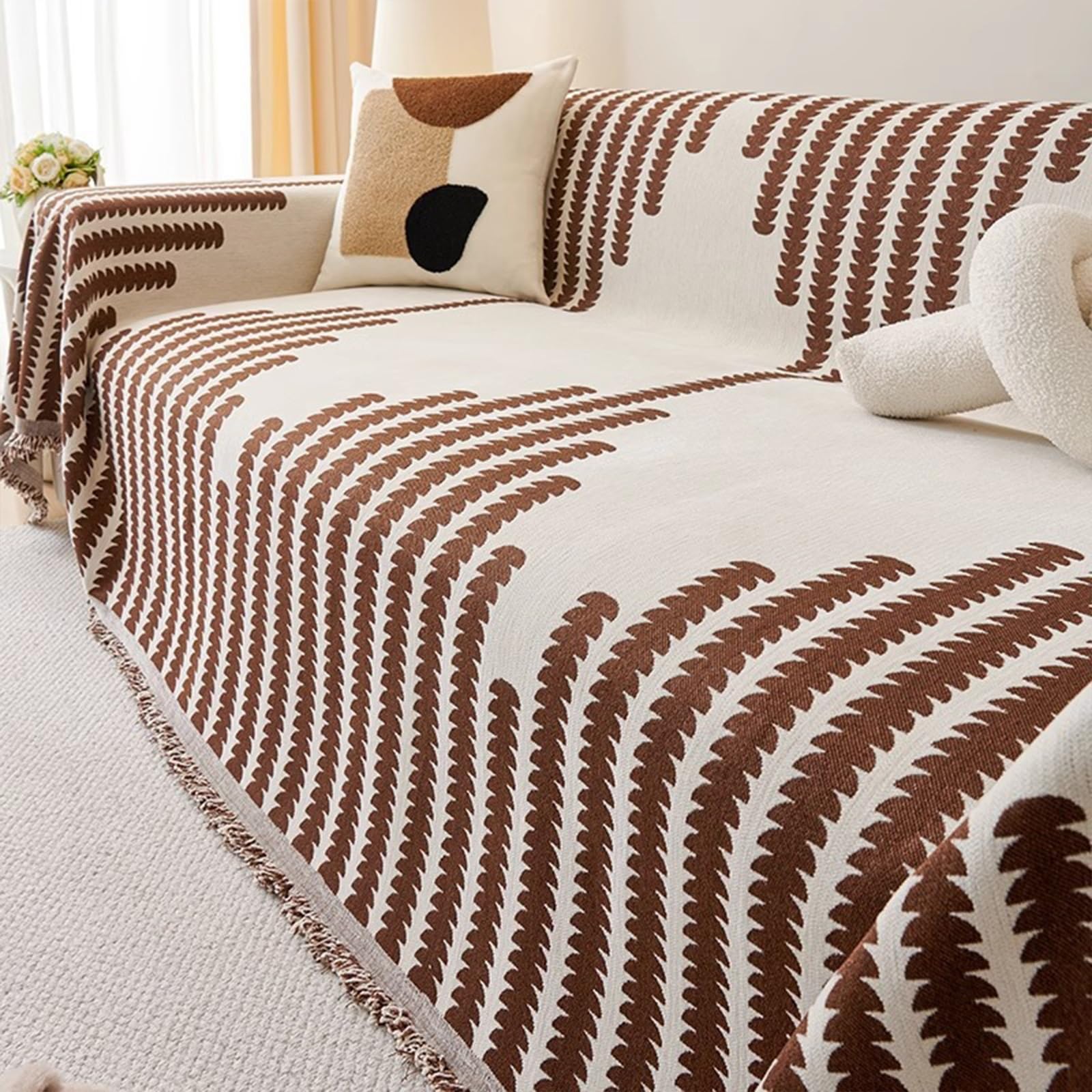 Housses canapé café 180x130 cm lavables et douces avec pompons