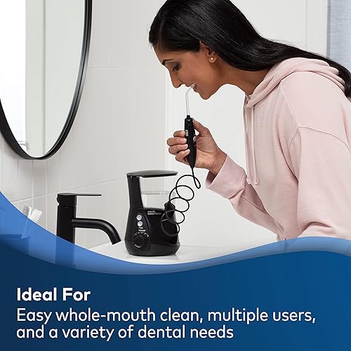 Miniatura 3 de Waterpik El irrigador dental acuario + puntas de reemplazo de prótesis de implantes - El sistema eléctrico de higiene dental elimina hasta el 99.9%