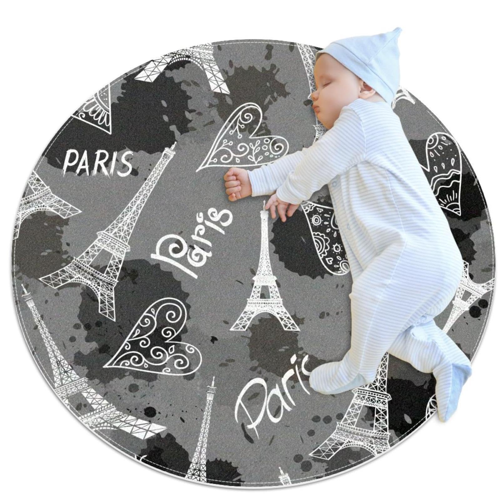 Petit tapis de salle de bain rond gris au design parisien