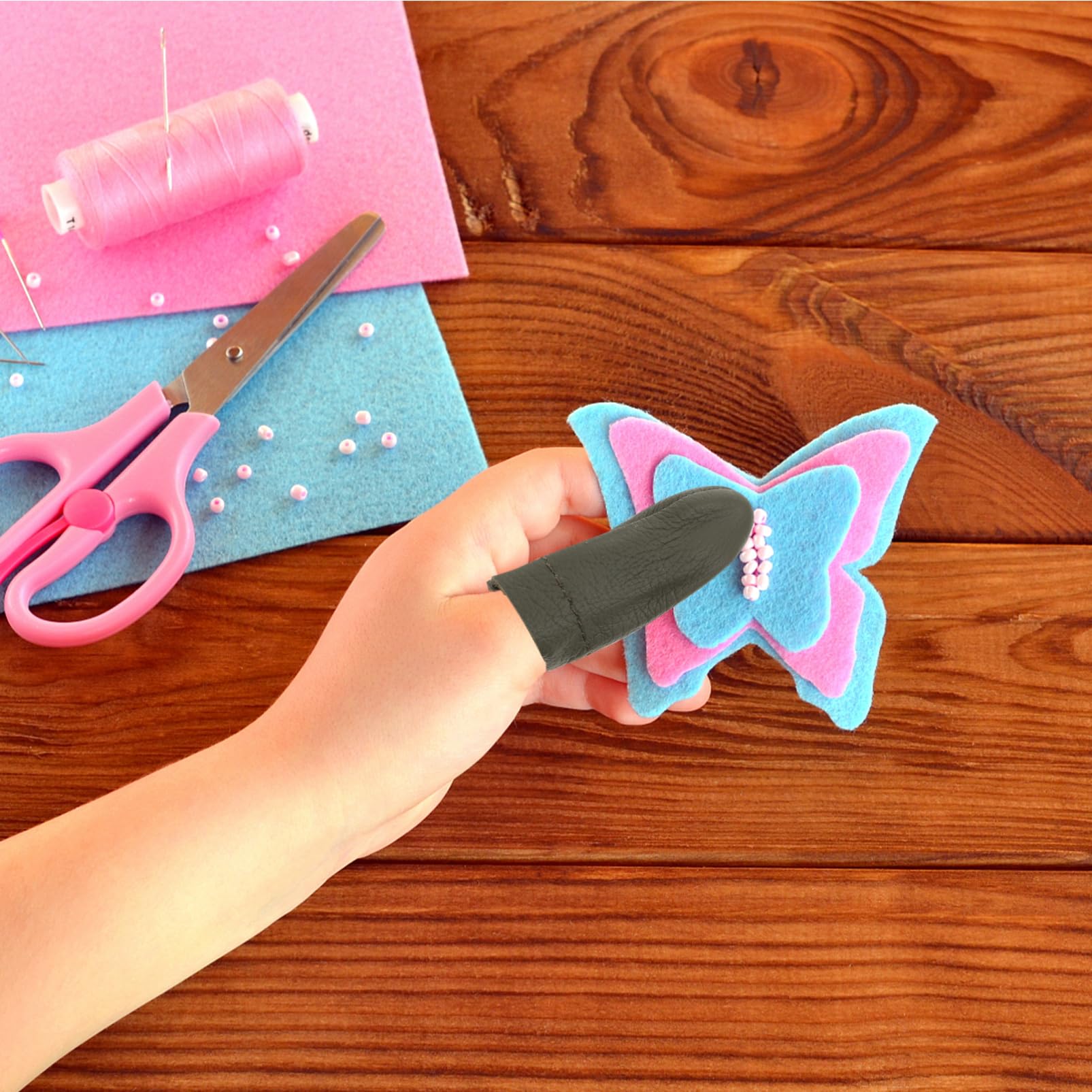 Housoutil Leather Finger Guard 2pcs Thimble Covers for Women Men Protective Finger Covers for Sewing Embroidery Crafting Random