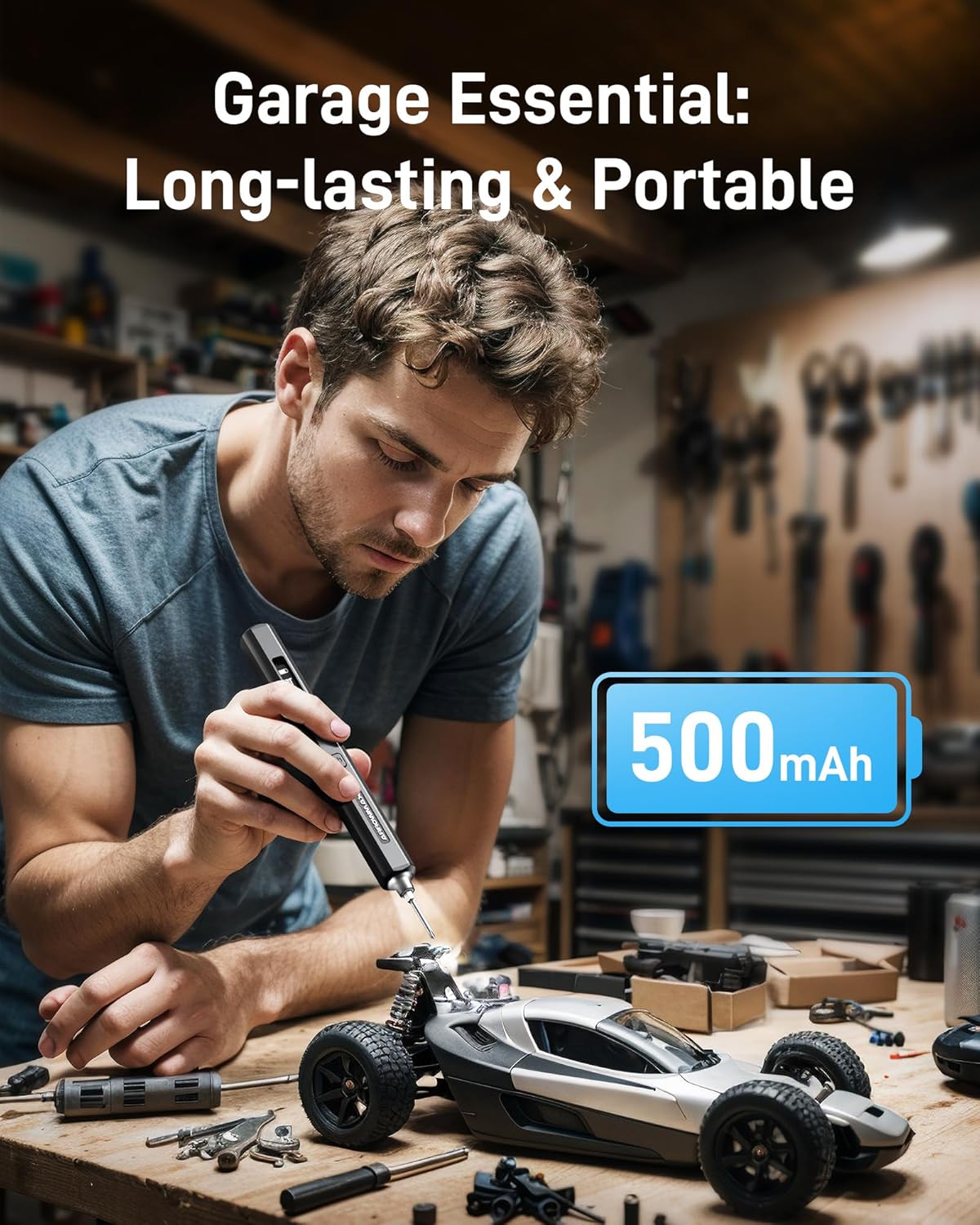 Man using the electric screwdriver to work on an RC car