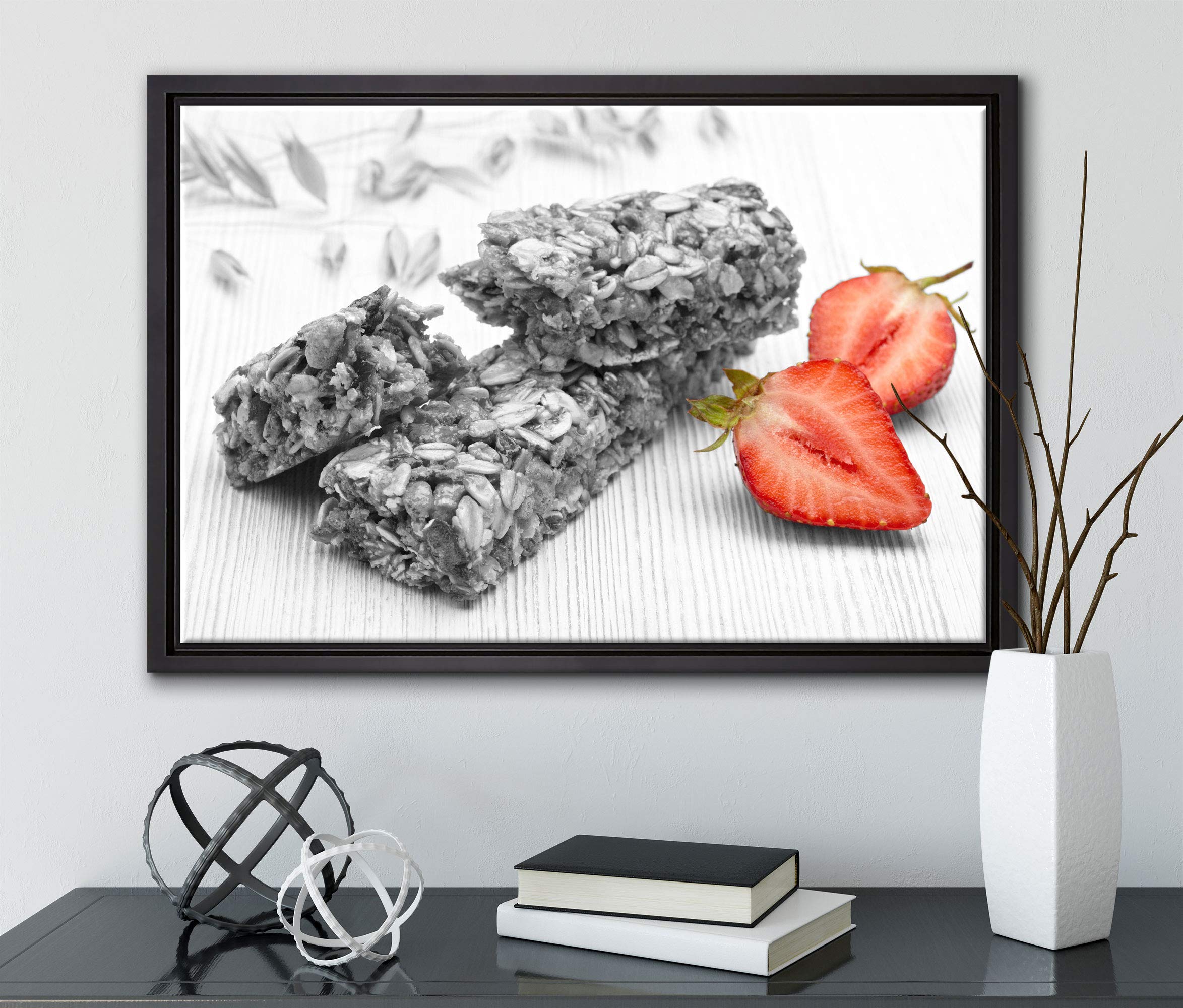 Pixxprint Müsliriegel mit Erdbeere Leinwandbild 100x70 cm im Bilderahmen, Wandbild, Schattenfugenrahmen, Kein Poster