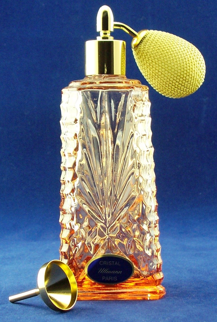 Flacon vaporisateur triangulaire cristal avec poire et pompon or rose