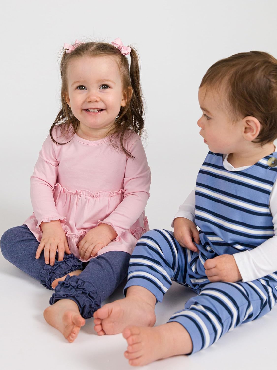 RuffleButts® Baby/Toddler Girls Long Sleeve High Low Flowy Ruffle Tunic Top