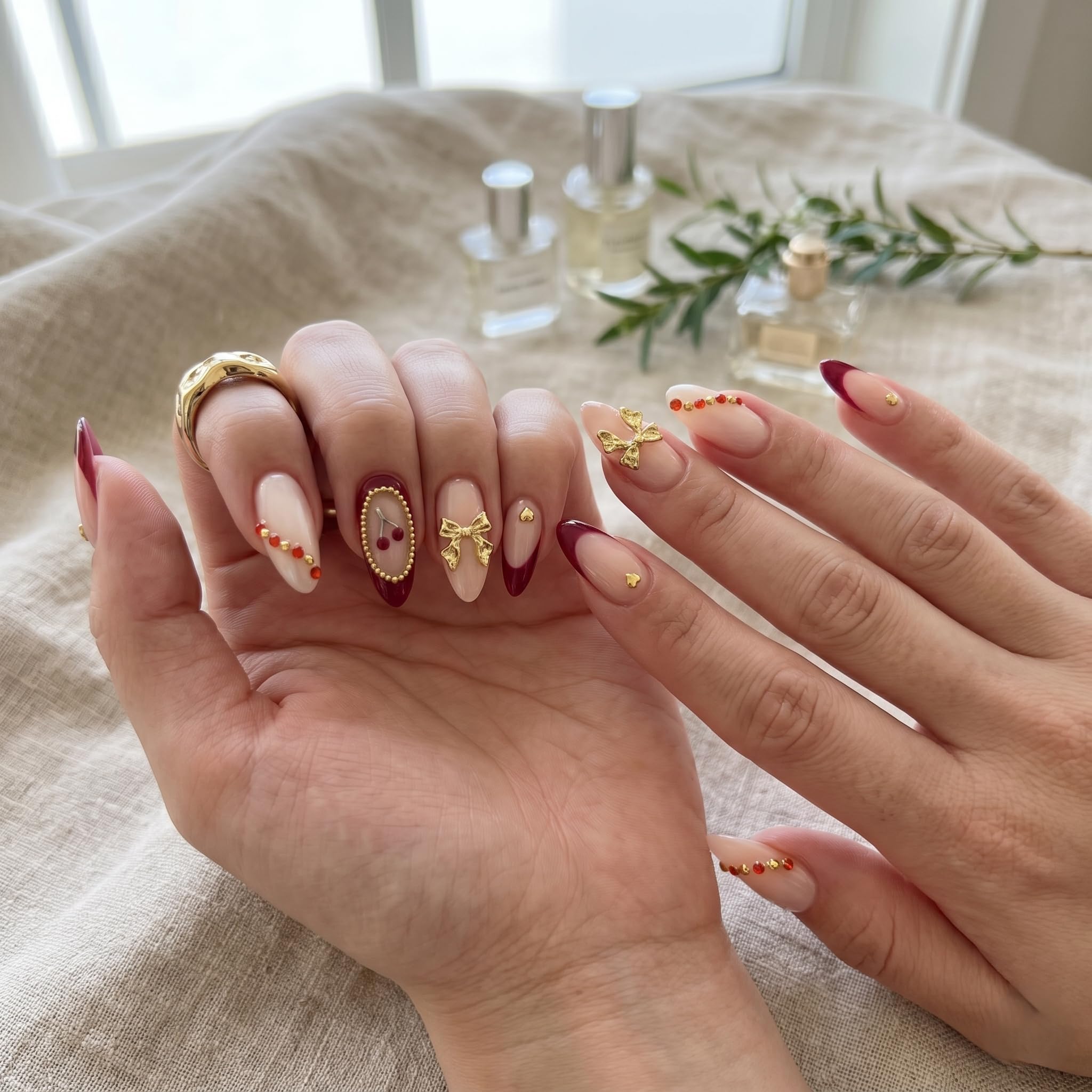 NAKHI Luxury Burgundy French Tip Press On Nails with Gold Bow, Cherry Art & Rhinestones | Almond Shape Reusable Fake Nails | Glossy Full Cover Stick On Nails for Women | 24 Pcs Nail Set-image-36