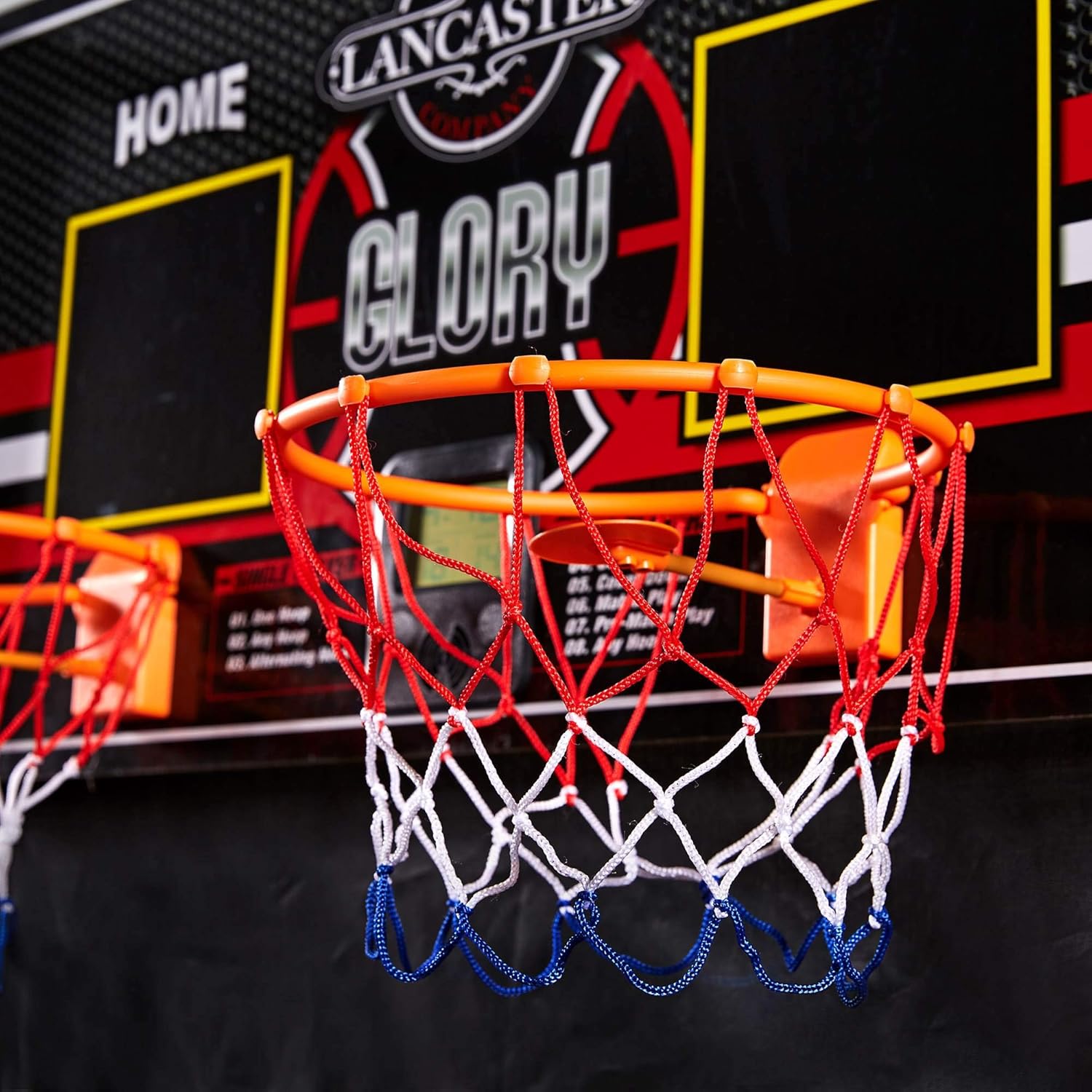 Close-up of the LED electronic scorekeeper displaying '1:40' for time and '18' for Player 1 and '16' for Player 2 scores.