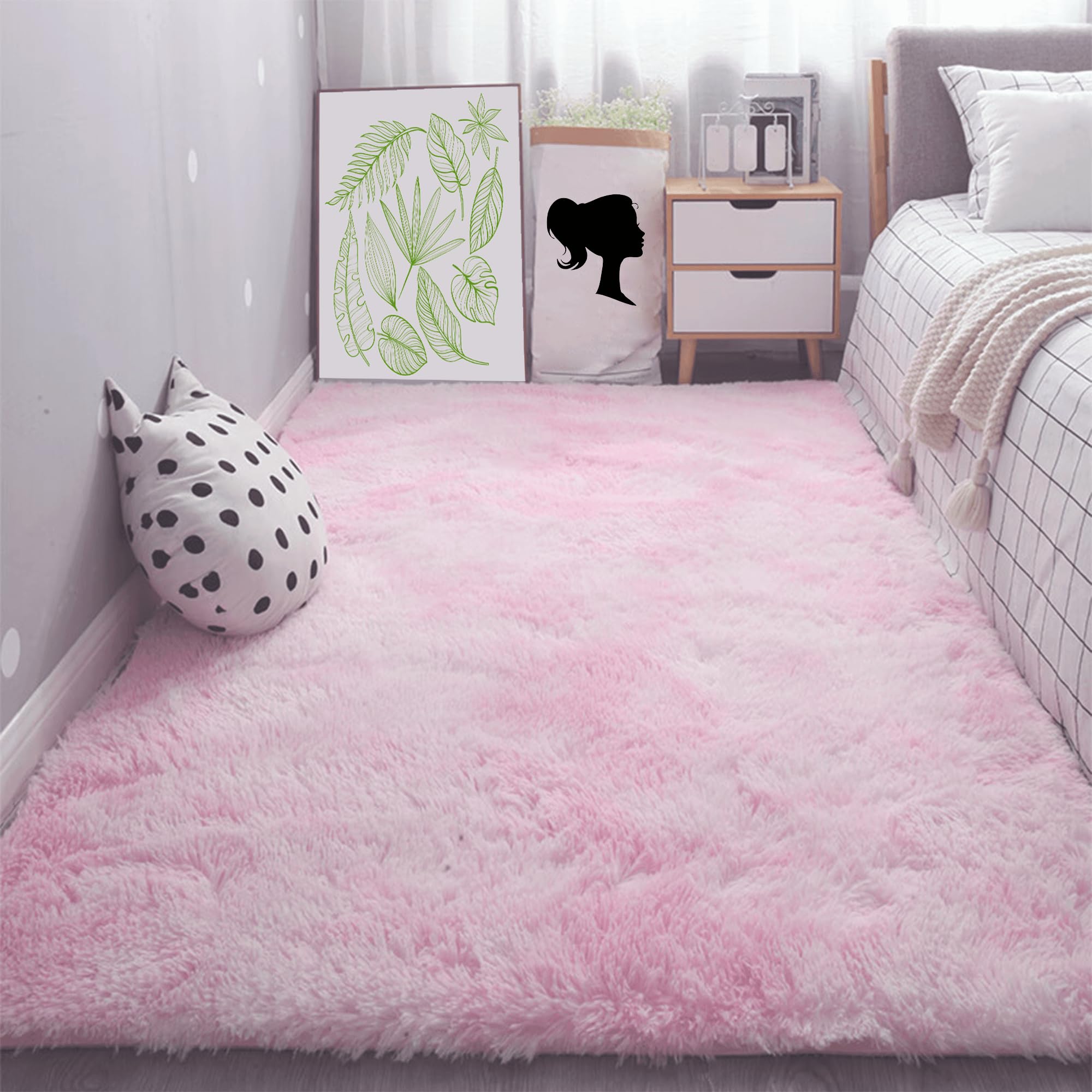 Descente de lit rose clair pour créer un coin cocooning et chaleureux dans la chambre
