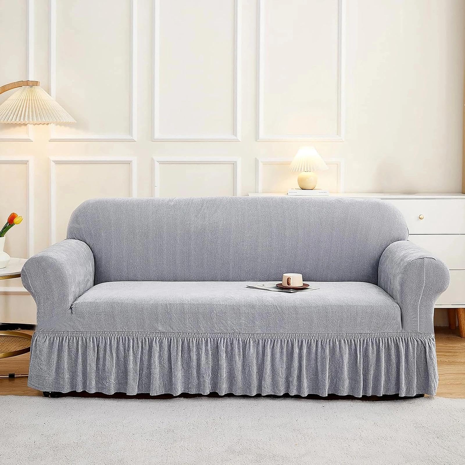 Housse de canapé 1 place grise extensible avec volants