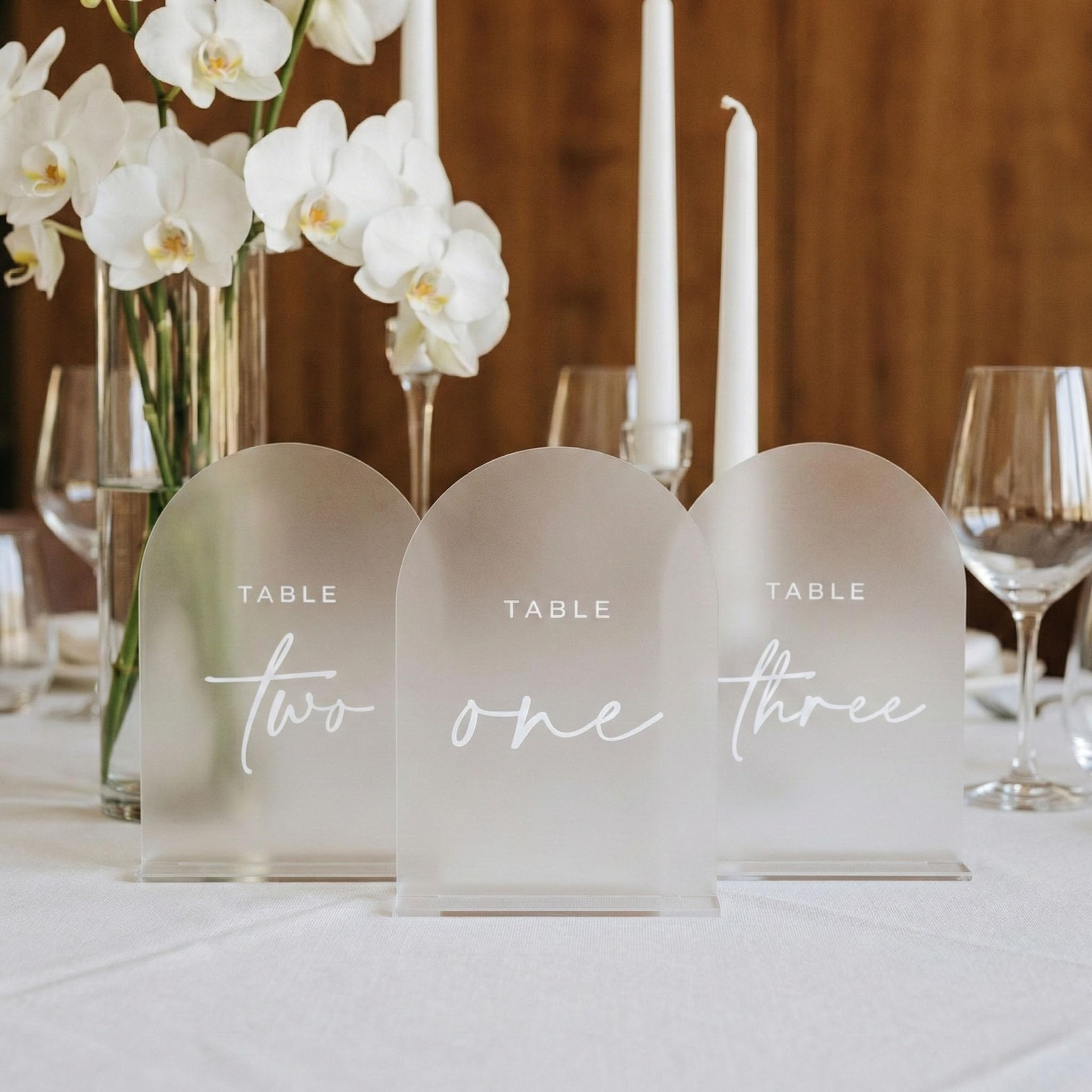 Photo 1 of Frosted Arch Wedding Table Numbers 1-10 with Stands, 5x7 Inch Frosted Acrylic Arch Sign with Raised White Numbers, Acrylic Table Numbers for Wedding Reception
