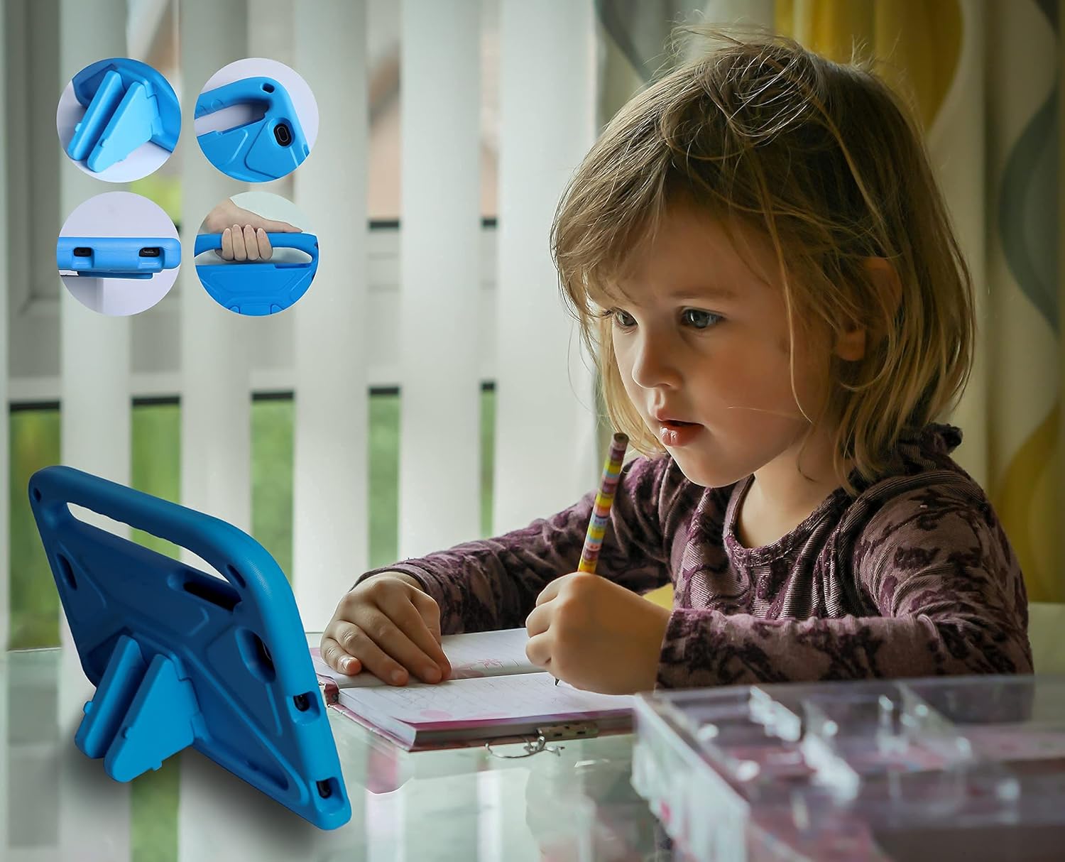 A child sitting at a desk, focused on the GOODTEL Kids Tablet G7 propped up by its blue protective case's integrated stand, while drawing in a notebook.