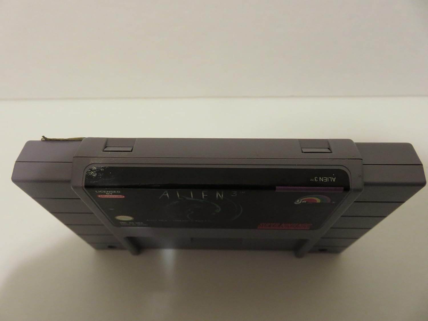 Rear view of the Alien 3 Super NES game cartridge label