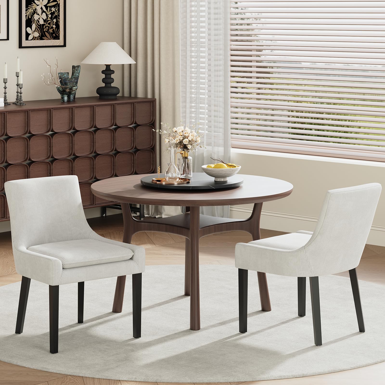 A set of COLAMY dining chairs arranged around a round wooden table in a dining area.