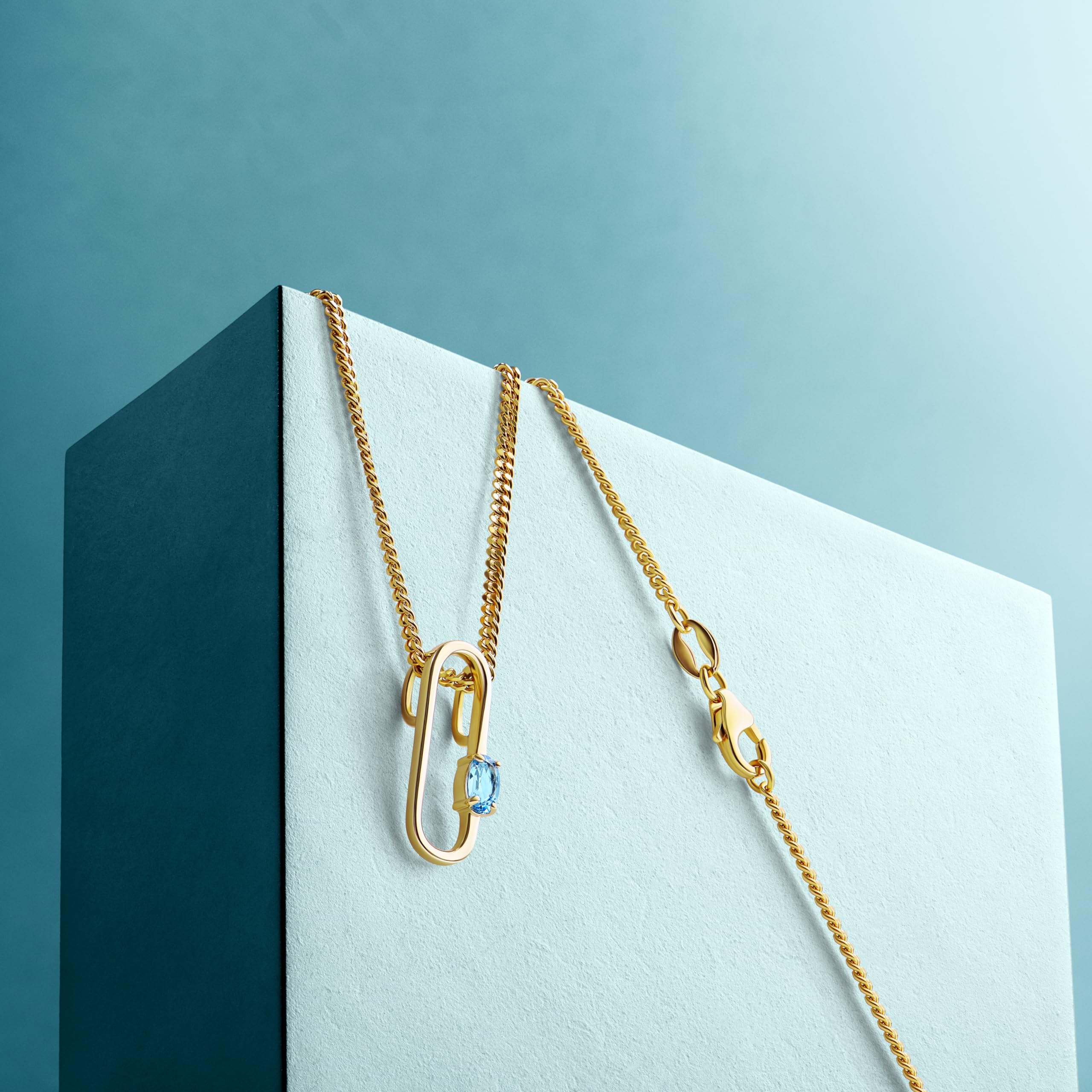MIORE Collana Donna Argento Placcata Oro Giallo 18KT, Catenina con Ciondolo Ovale in Argento 925 anallergico e Topazio Blu Naturale. Catena Cm 45.