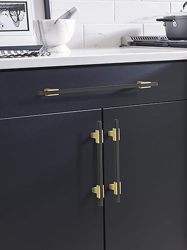 Miniatura 2 de Amerock  Mango de gabinete  Oro cepilladonegro mate  10-116 pulgadas (10.079 in) de centro a centro  Urbanita  paquete de 1 unidad  Jaladera de