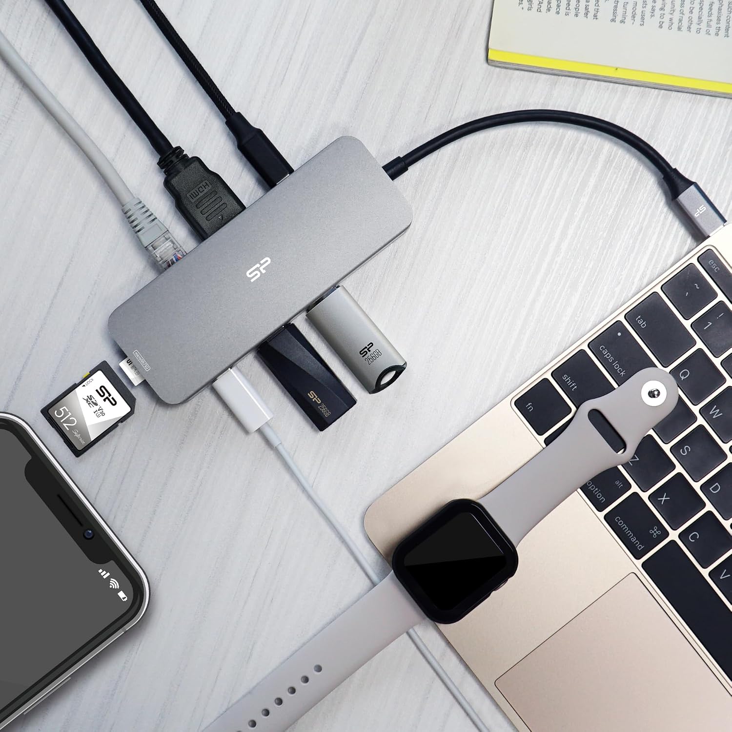 Silicon Power SR30 8-in-1 Docking Station connected to a laptop with multiple peripherals