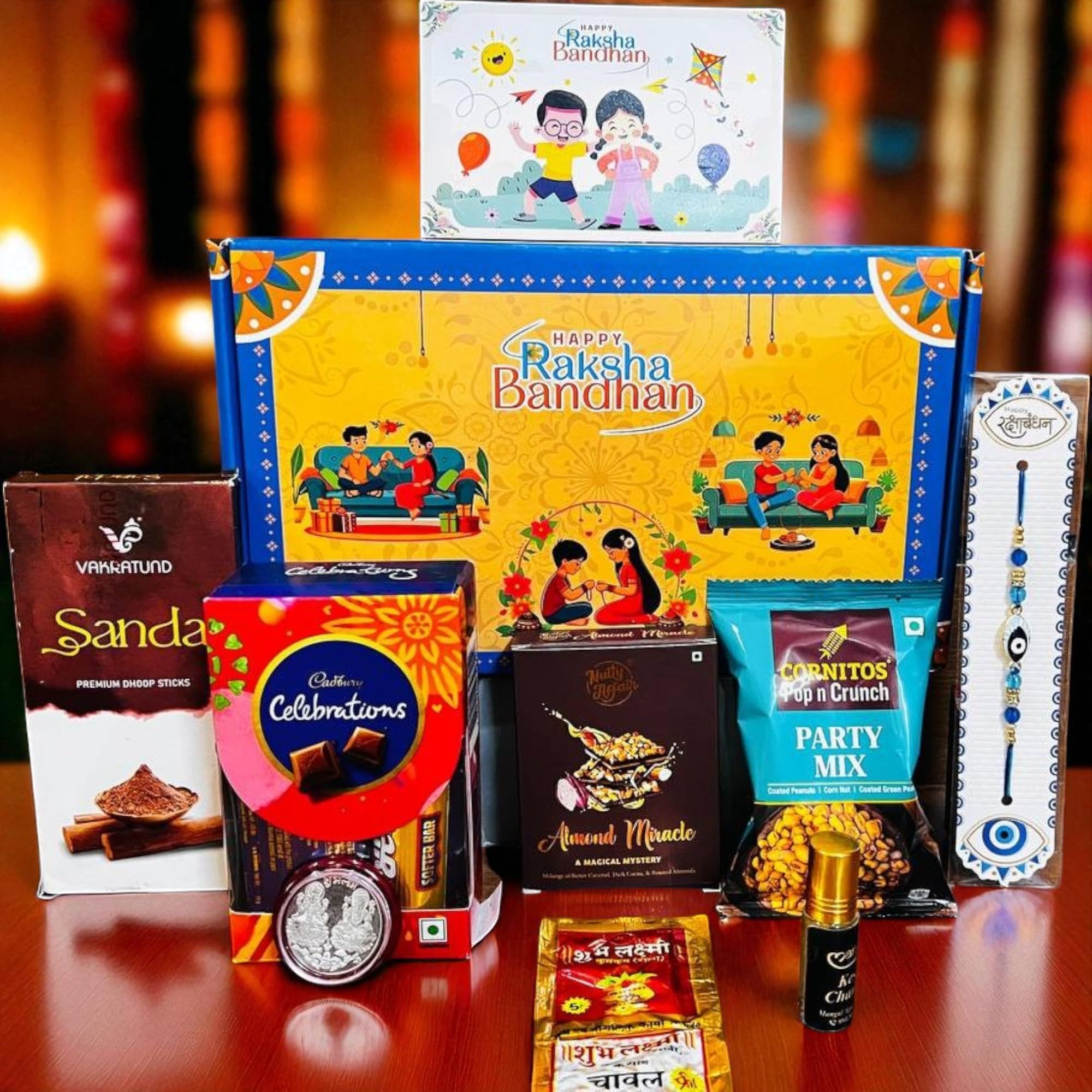 SOULWARE Rakhi Gift Combo Box for Brother Bhaiya & Bhabhi-9 Inclusions + Evil Eye Rakhi Nazar Kavach|Chocolate,Millet Namkeen,Almond Bar,Incense Sticks & Stand,Perfume,Coin,Card,Roli Chawall-image-7