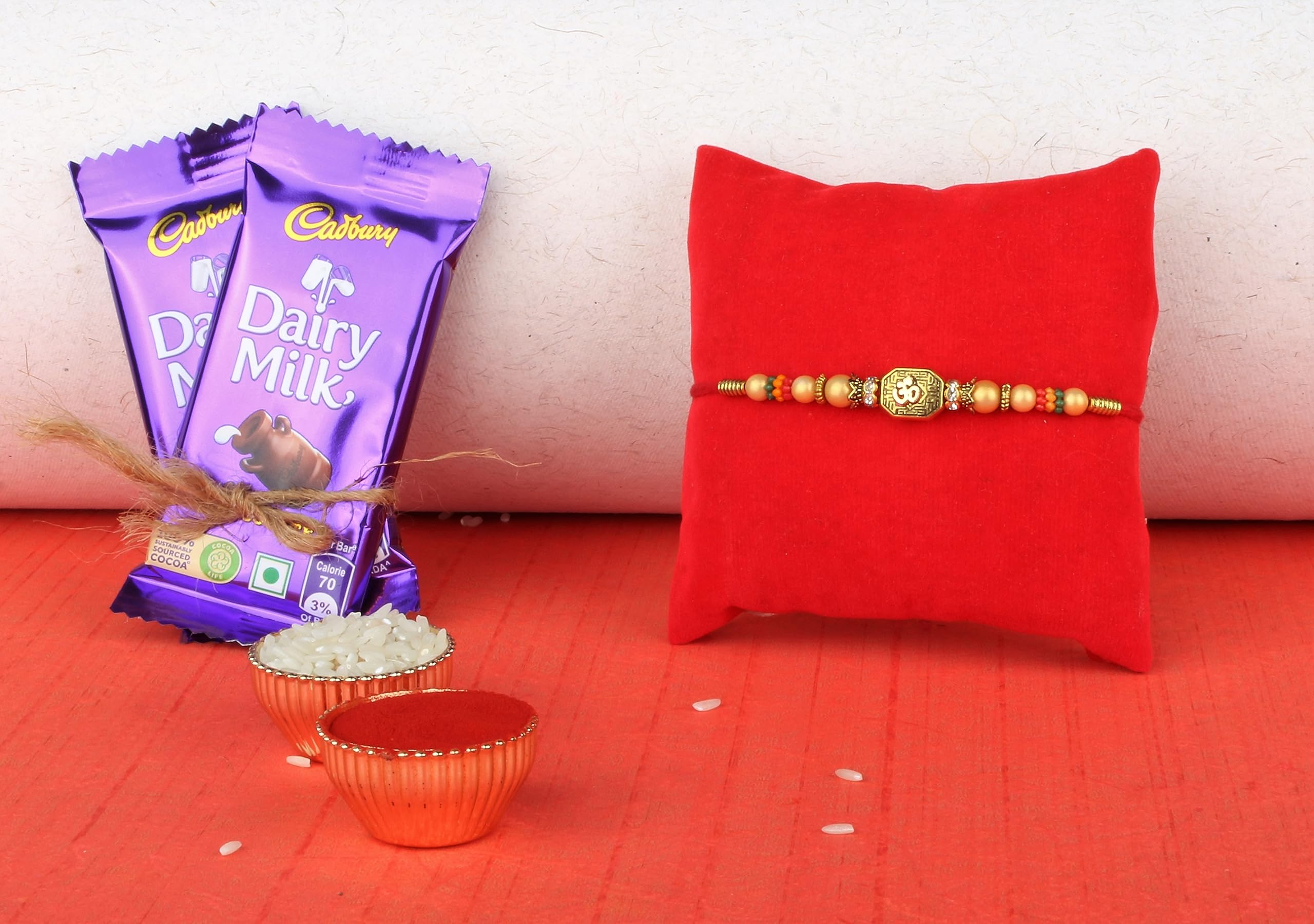Astonished Retail Premium Designer Om Rakhi with 2 Pieces Dairy Milk Chocolates | Rakhi Chocolate Gift for Brother | Roli, Chawal, Chandan, Misri | 4 (B09B3PH4RG) Amazon Price History, Amazon Price Tracker