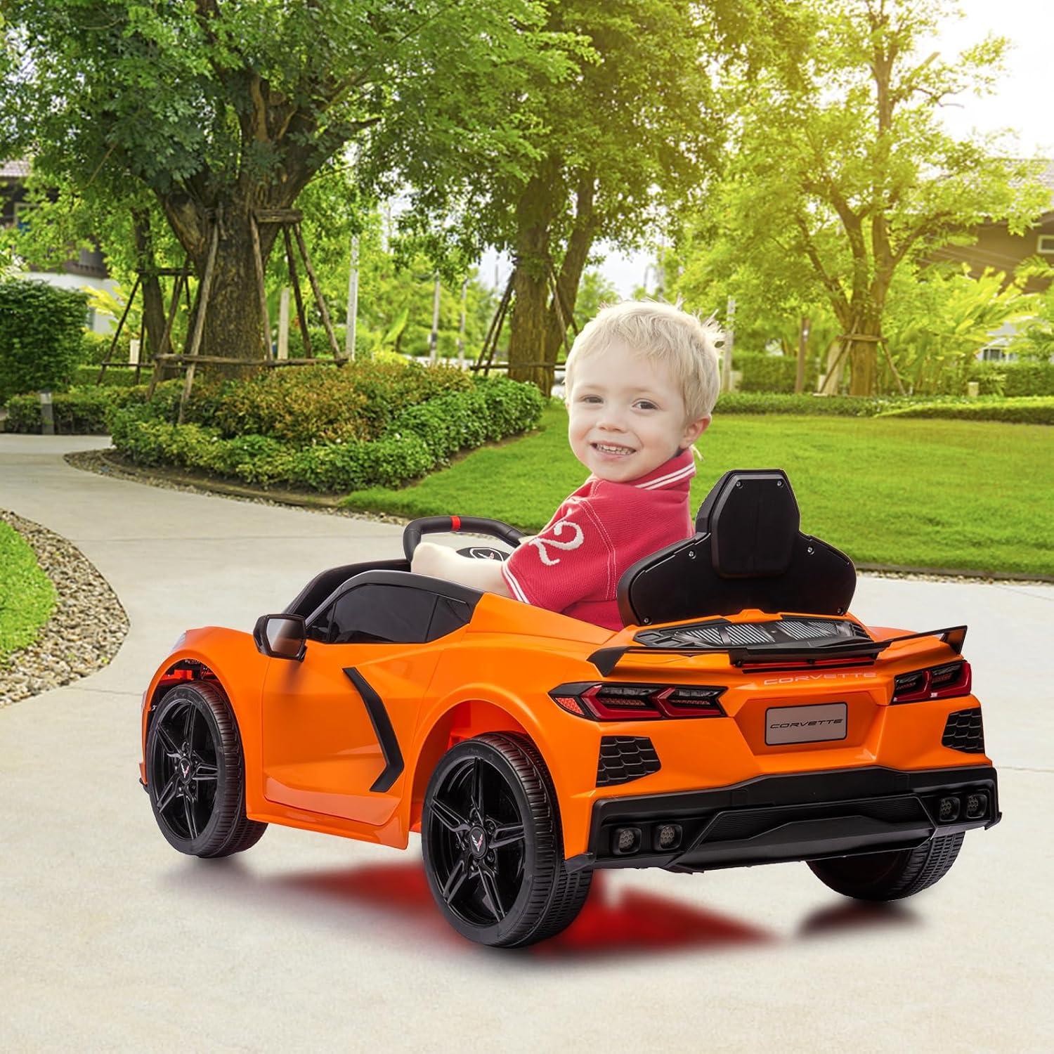 Ride on Sports Car 12V Battery Powered Car for Kids Licensed Corvette Toddles Electric Car Toy with Remote Control, Visual Dashboard, Music, LED Lights, Gifts for Boys Girls, Orange