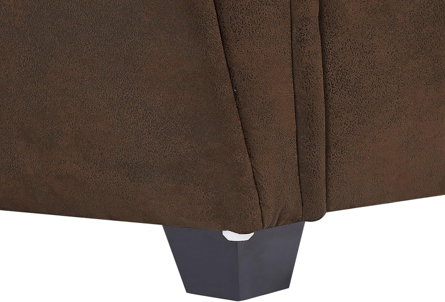 Close-up of a sofa foot, showing the wooden construction