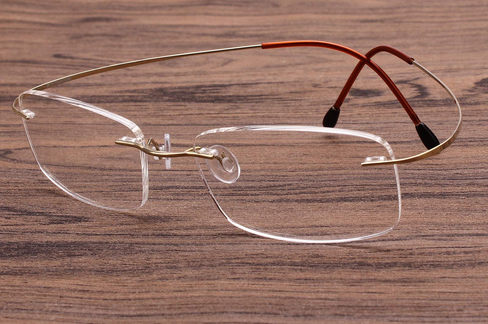 Agstum Reines Titan randloser Rahmen optische Scharnierbrille für Damen und Herren, gold, M