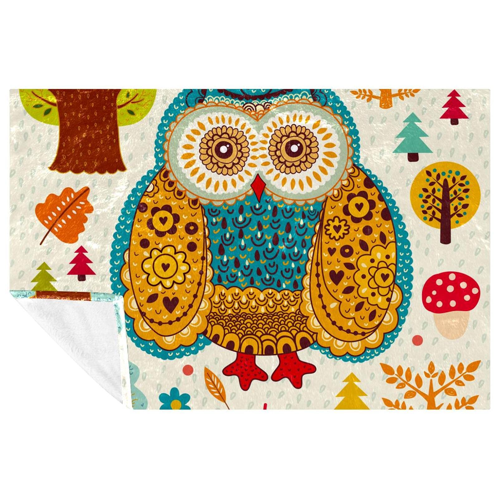 Couverture douce hibou pour des moments cocooning sur votre canapé