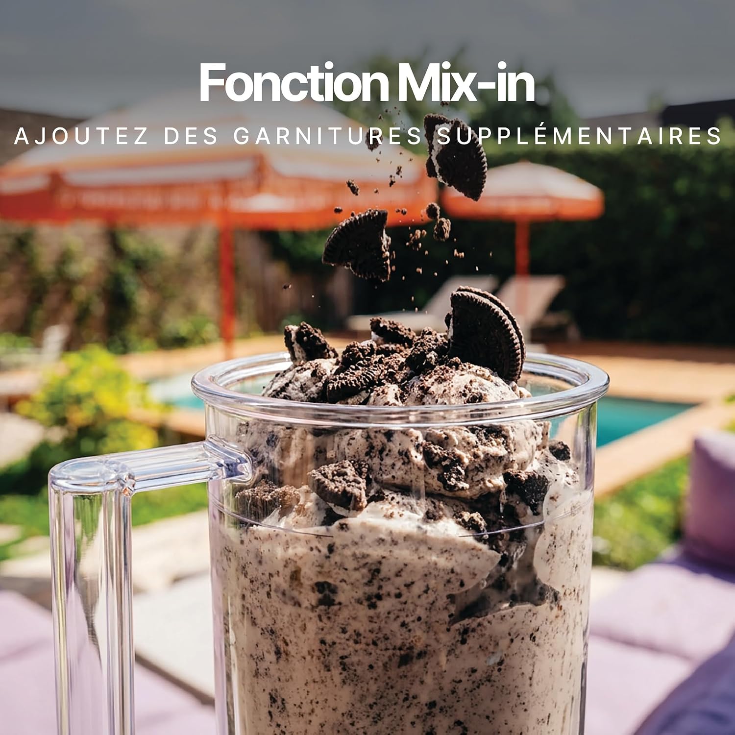 Close-up of the Mix-in function in action, showing crushed cookies being added to ice cream in an EasyCup.