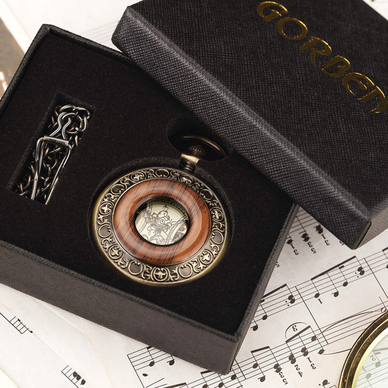Orologio da tasca con catena e medaglione, quadrante cavo