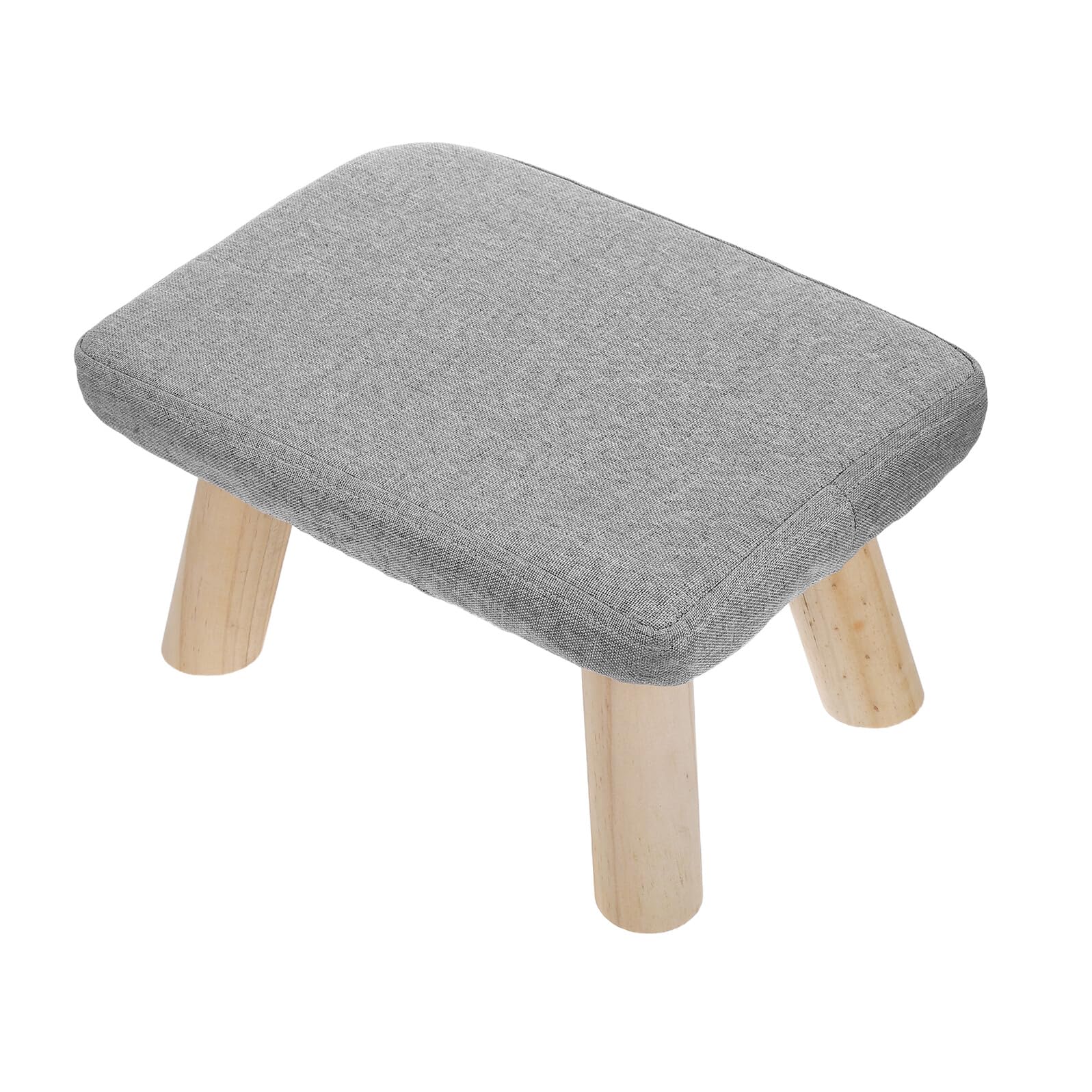 Tabouret repose-pieds en bois contre le mal de dos dans le salon