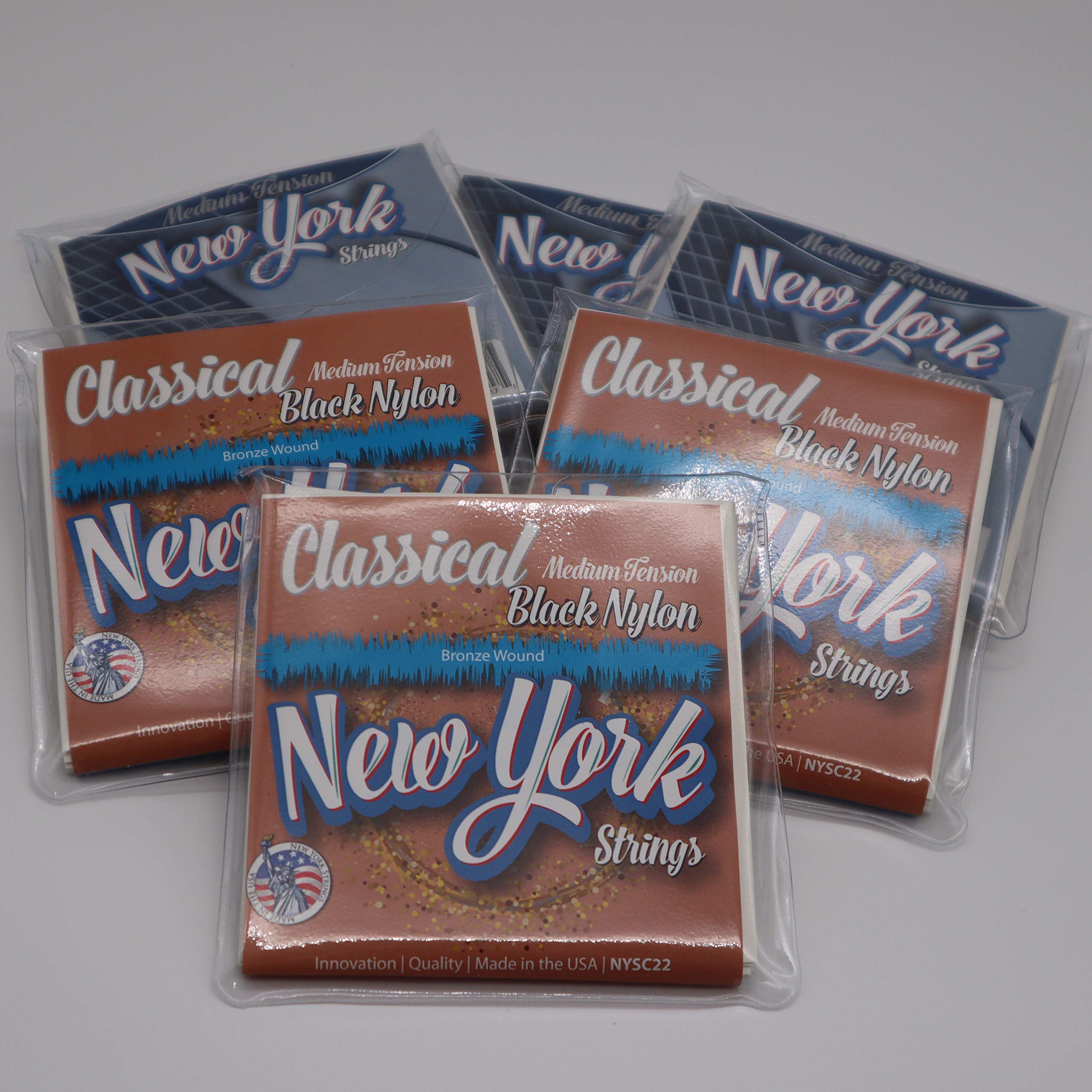NYSC22 - Cuerdas para guitarra clásica de nailon negro - Enrollado en bronce - Tensión media - Innovación - Calidad - Las New York Strings son una sinfonía de cuerdas - Fabricado en