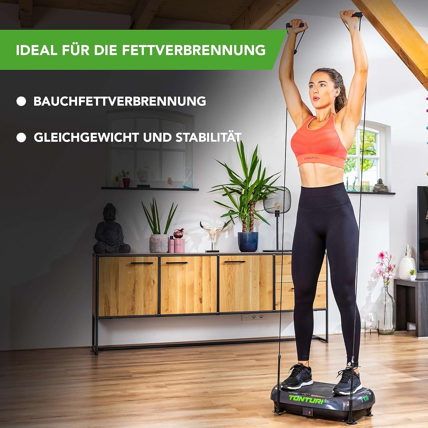 Woman using resistance bands attached to the Tunturi V10 Vibration Plate for an overhead press exercise.