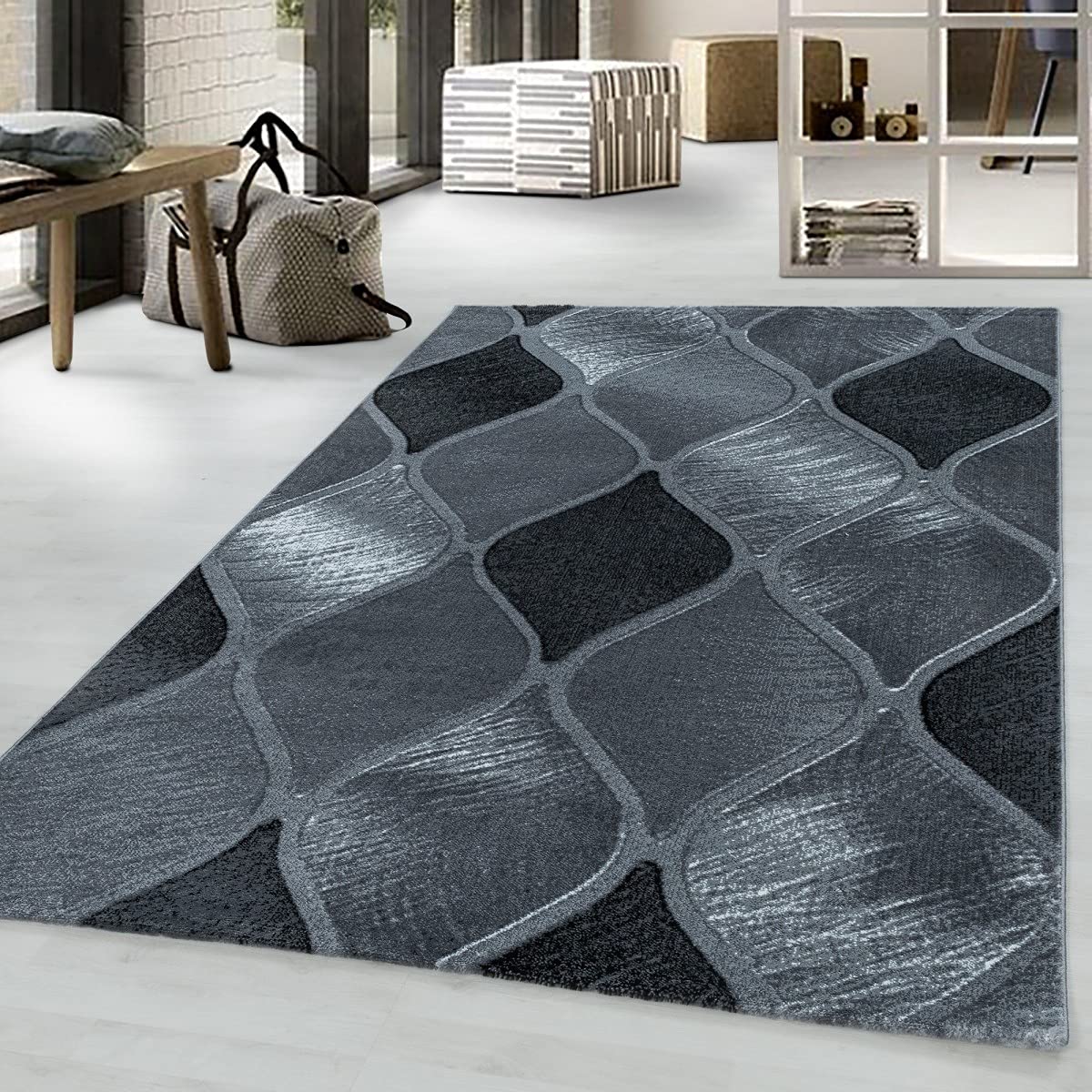 Tapis rond design grille noir 140x200 cm pour salon moderne