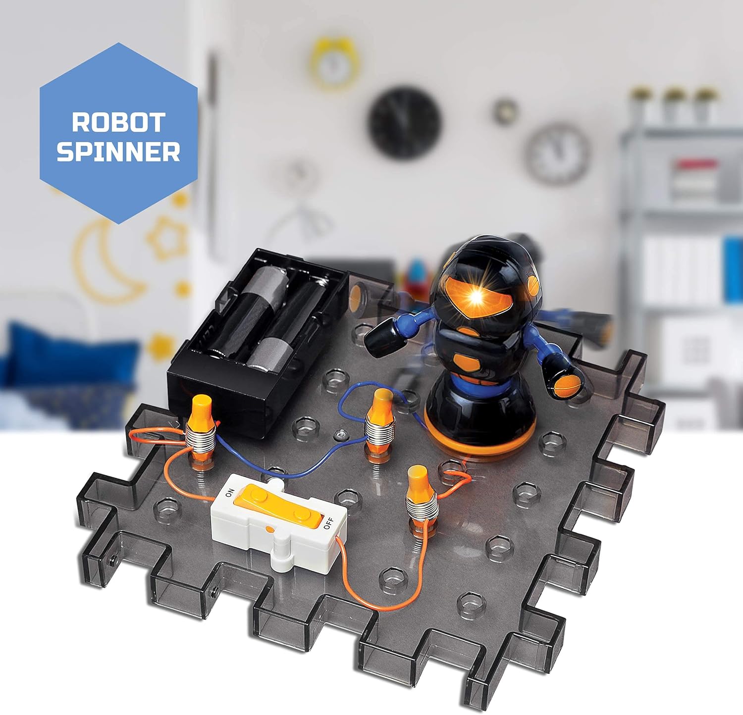 The spinning robot module on a breadboard, with its eyes glowing, indicating it is active.