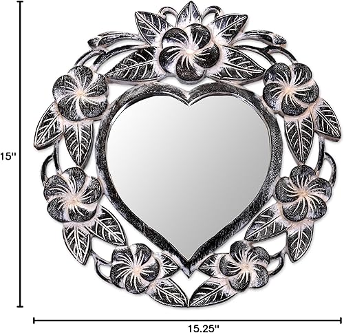Miniatura 6 de NOVICA Espejo de pared floral tallado a mano de madera de Suar natural en forma de corazón de Indonesia 'Frangipani Heart'