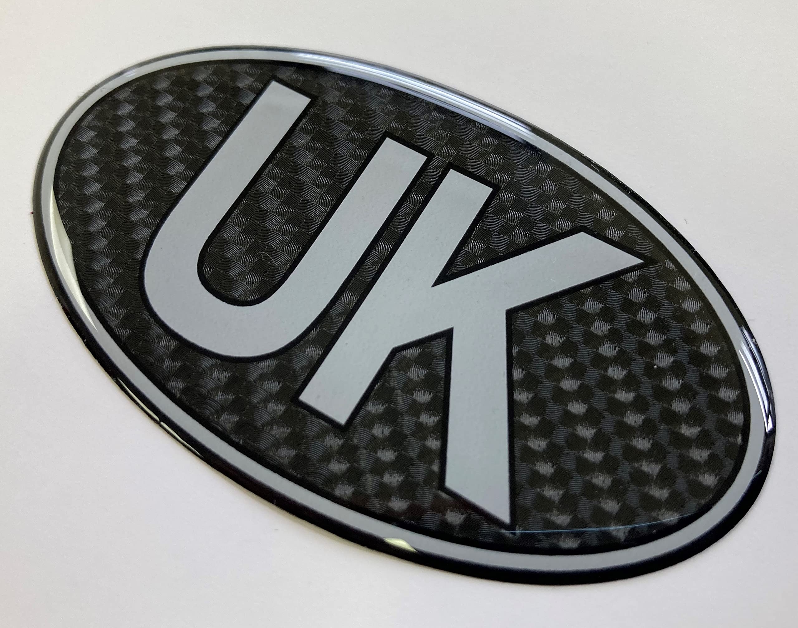 UK Car Oval 75mm CARBON FIBRE EFFECT Sticker/Decal - Retro - GLOSS DOMED GEL FINISH - Silver text on Carbon Fibre Effect Background