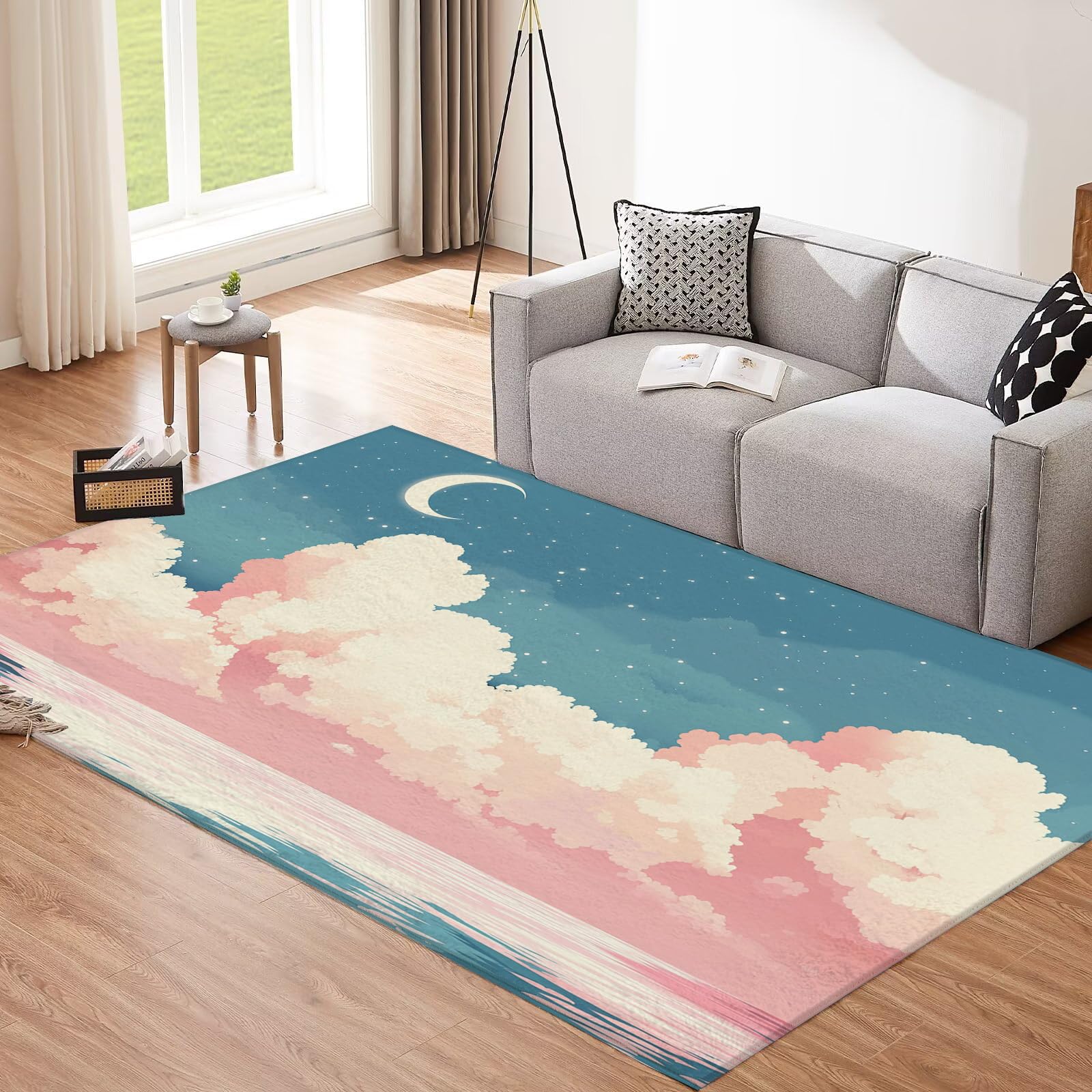 Tapis nuages roses doux pour créer un coin lecture dans la chambre